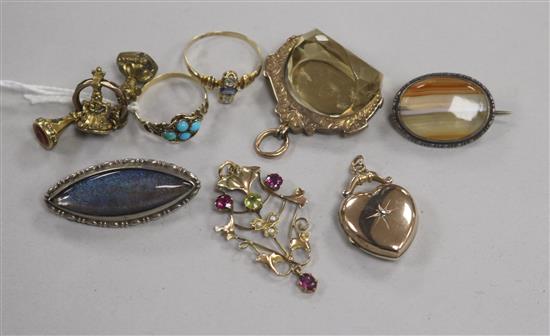 Two Victorian yellow metal and gem set rings, an Edwardian 9ct gold spinning fob, a 9ct gold pendant and other jewellery.